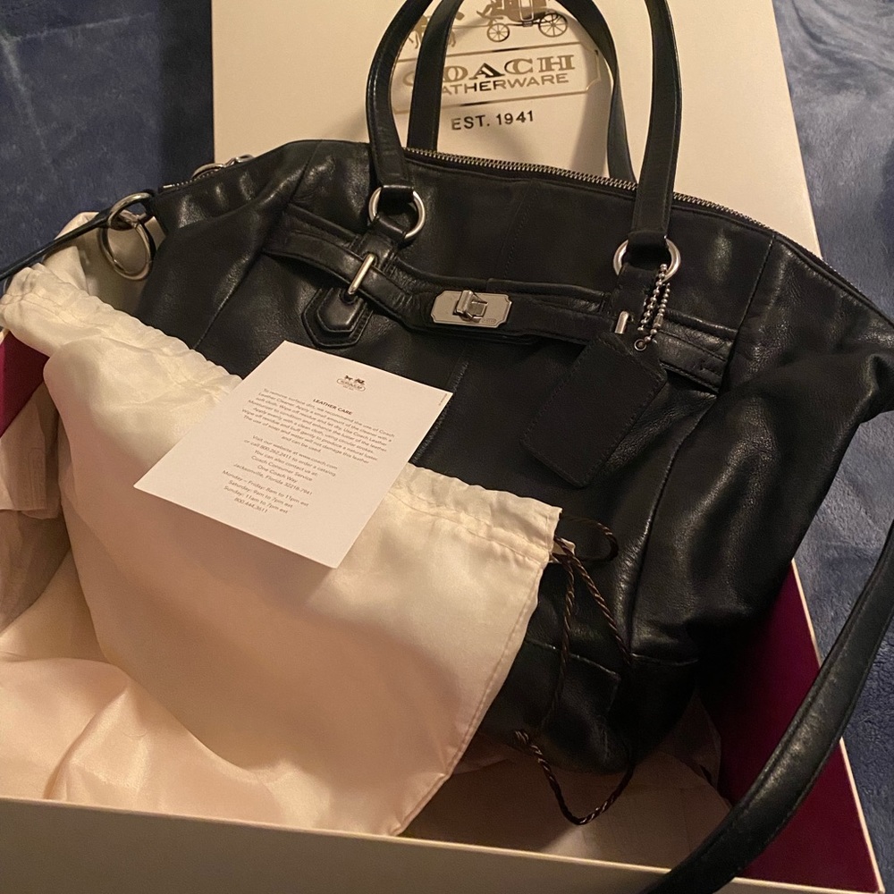 Coach, black leather bag in original box with dust jacket, leather care card.